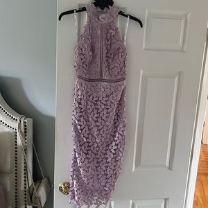 Never worn formal dress. Lavender color. Perfect wedding guest dress!!